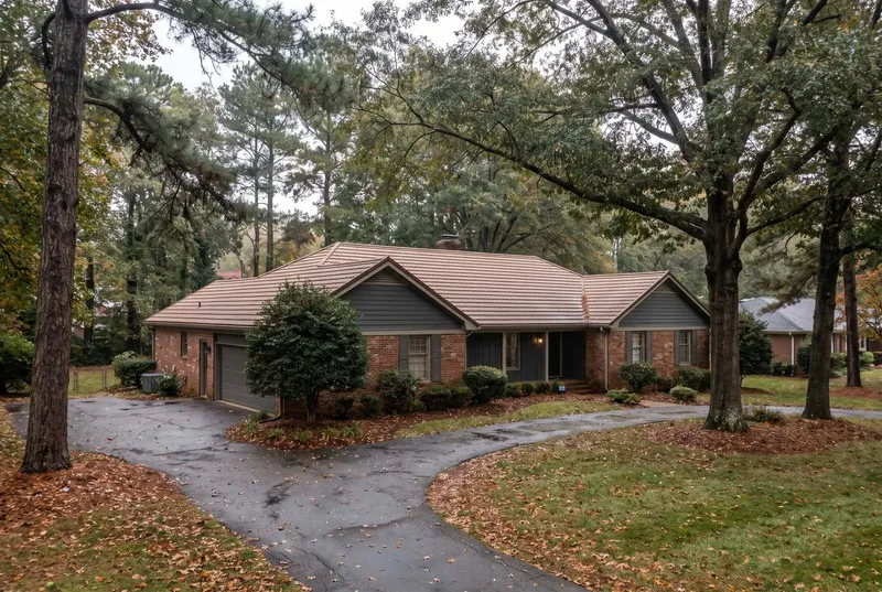stone-coated steel tile roof on a brick ranch home